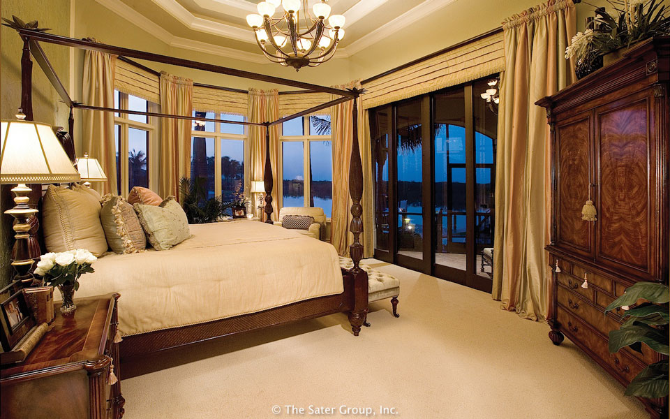 The master suite bed room is huge with lots of windows and access to the veranda.