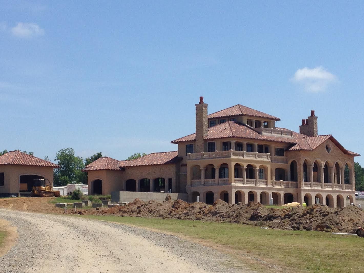 Tuscan architecture - Rear view of Tuscan home designed by the Sater Group