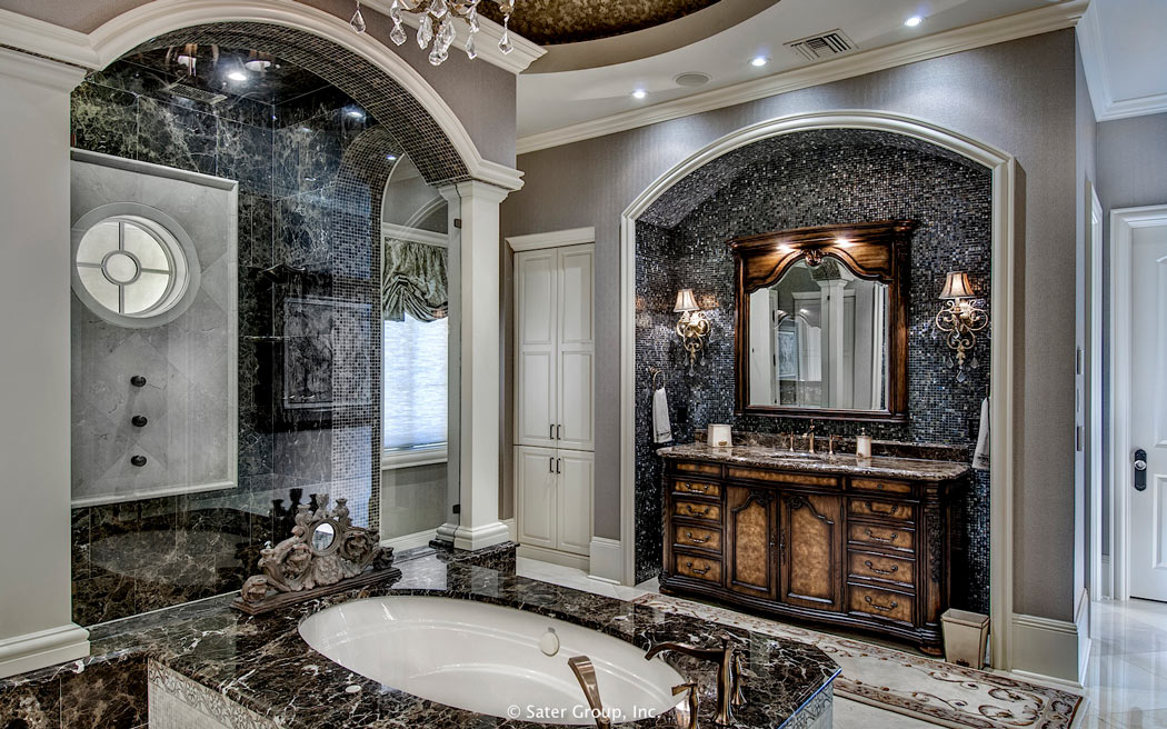 The master suite bathroom with large walk-in shower and custom vanity.